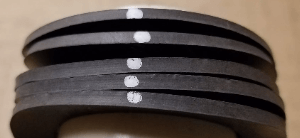 Color Coded Gaskets - Stack of dot coded gaskets.